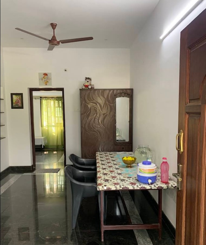 Balcony seating at Amaravathy Homestay